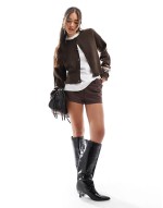 Crimson pull-on kitten heeled knee boots in black