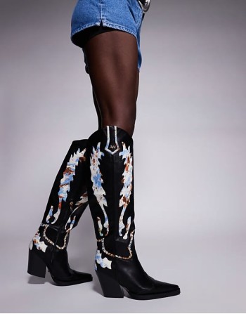 Dumas cow print western knee boots in black