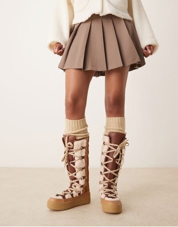 stitch detail shearling mukluk boots in vintage tan