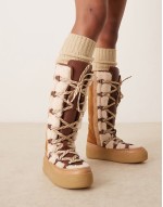 stitch detail shearling mukluk boots in vintage tan