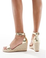 Amber wedge heeled espadrilles in gold