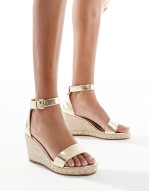Amber wedge heeled espadrilles in gold